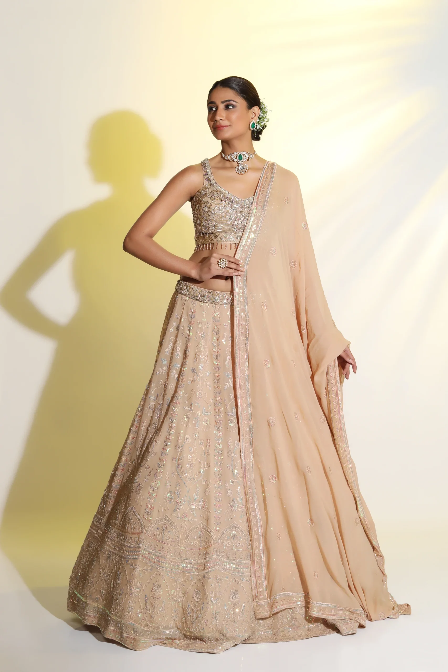 Handcrafted semi bridal lehenga with side dupatta.